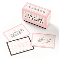 A Brass Monkey Date Night Challenges box sits next to three cards with unique, playful activity ideas for couples, each designed in pink, white, and black.