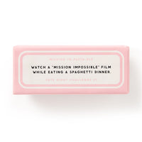 A pink Brass Monkey Date Night Challenges card titled MISSION IM-PASTA-BLE dares you: Watch a Mission Impossible movie while eating spaghetti. It’s Challenge 41 from the collection.