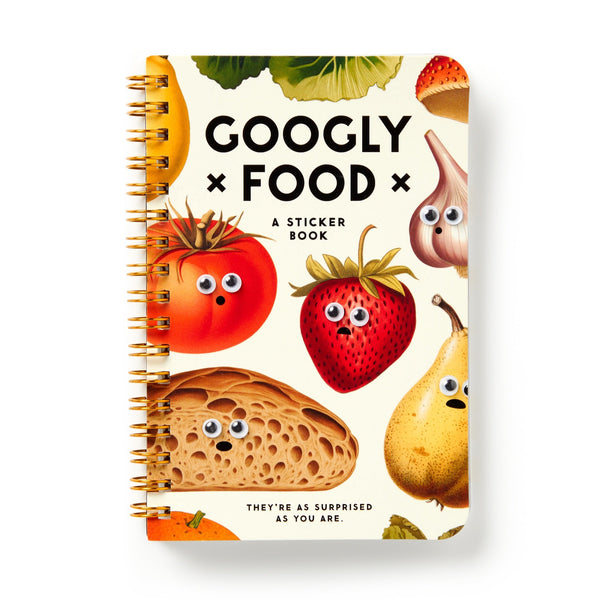 The Googly Food Sticker Book by Brass Monkey features illustrated foods—tomato, lettuce, garlic, strawberry, pear, and bread—on the cover with googly eye stickers and surprised expressions. Spiral-bound for easy use.