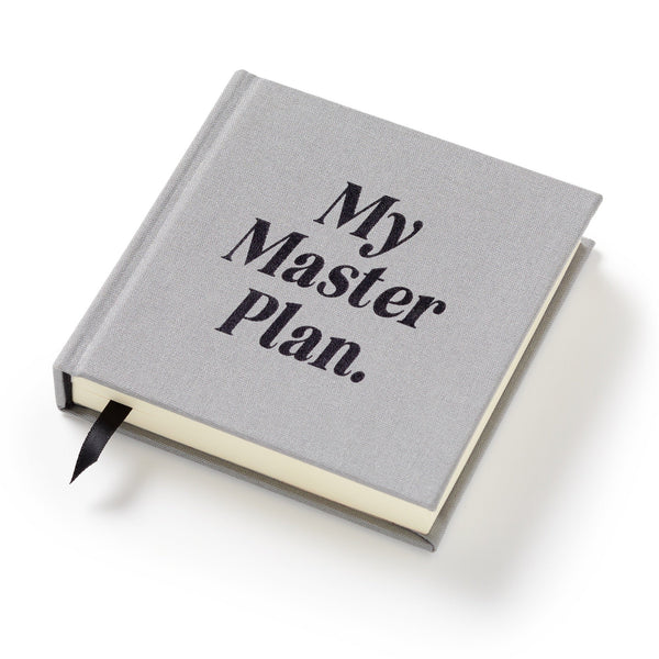 A hardbound gray My Master Plan Productivity Guide by Brass Monkey, with bold black lettering and a black ribbon bookmark—ideal for helping procrastinators organize tasks.