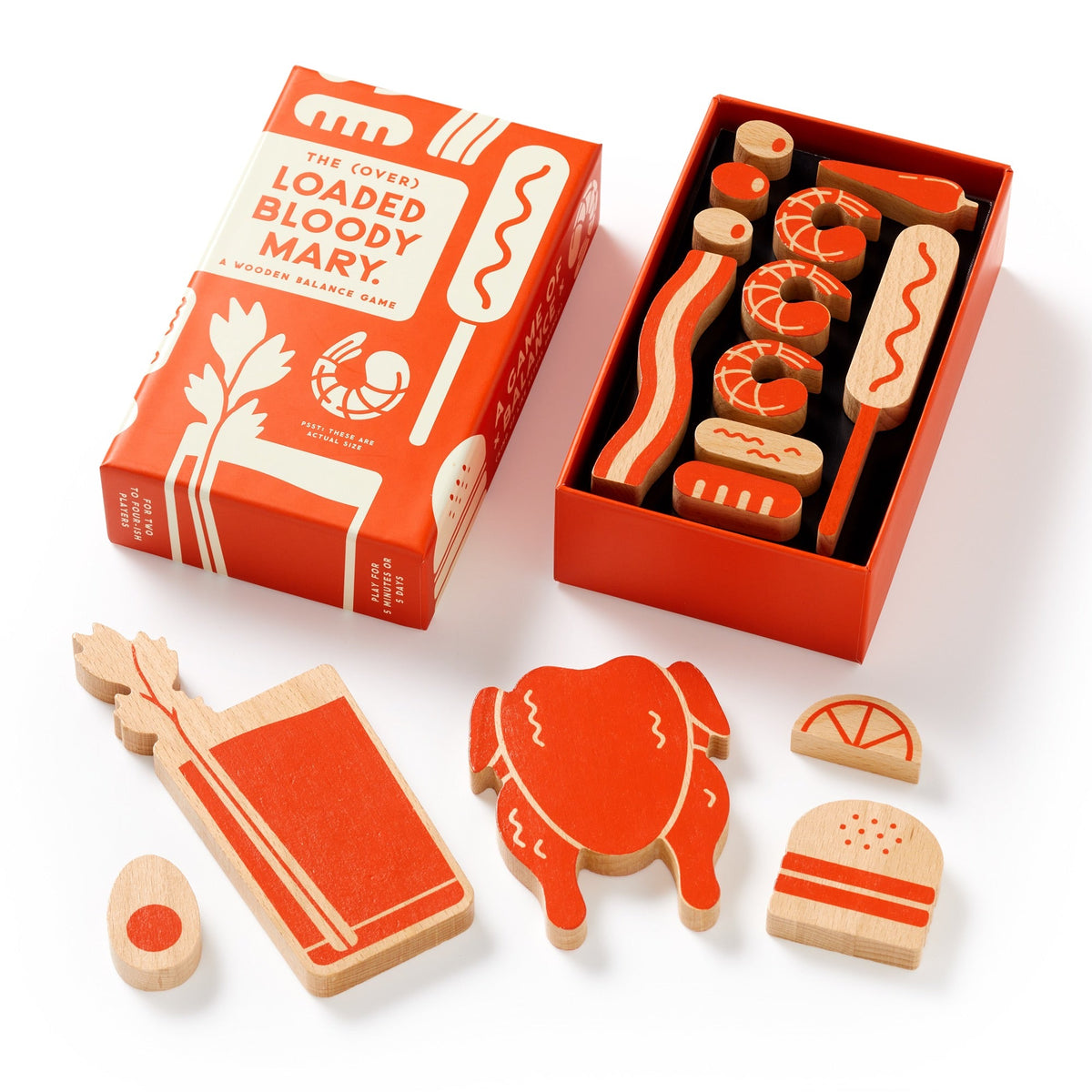 Brass Monkeys (Over) Loaded Bloody Mary Balance Game features painted wooden pieces shaped like a Bloody Mary, garnishes, burger, egg, shrimp, and more—all displayed with its vibrant game box.
