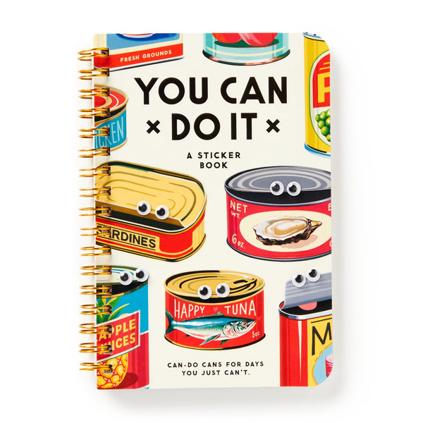 Brass Monkey’s You Can Do It Googly Sticker Book features spiral binding and retro food can stickers—each with googly eyes and fun labels like “HAPPY TUNA.” The cover reads, “YOU CAN DO IT” and “CAN-DO CANS FOR DAYS YOU JUST CAN’T.”.