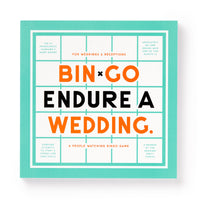 A turquoise-bordered book by Brass Monkey, titled Bin-go Endure A Wedding Bingo Book, features white center text and bingo squares with funny scenarios, like “The DJ pronounces someones name wrong,” for people-watching at weddings.