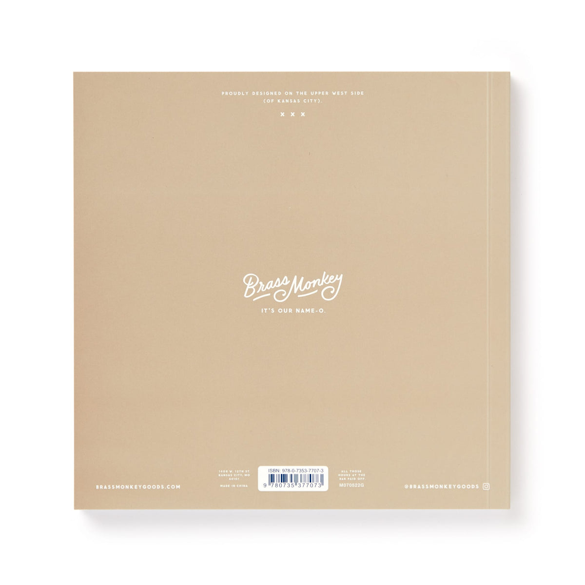 A light brown square package for Brass Monkey’s Bin-go Get Some Drinks Bingo Book features the logo and slogan It’s Our Name.© in white at the center, plus smaller white text and a barcode near the bottom—perfect for bar or restaurant games.