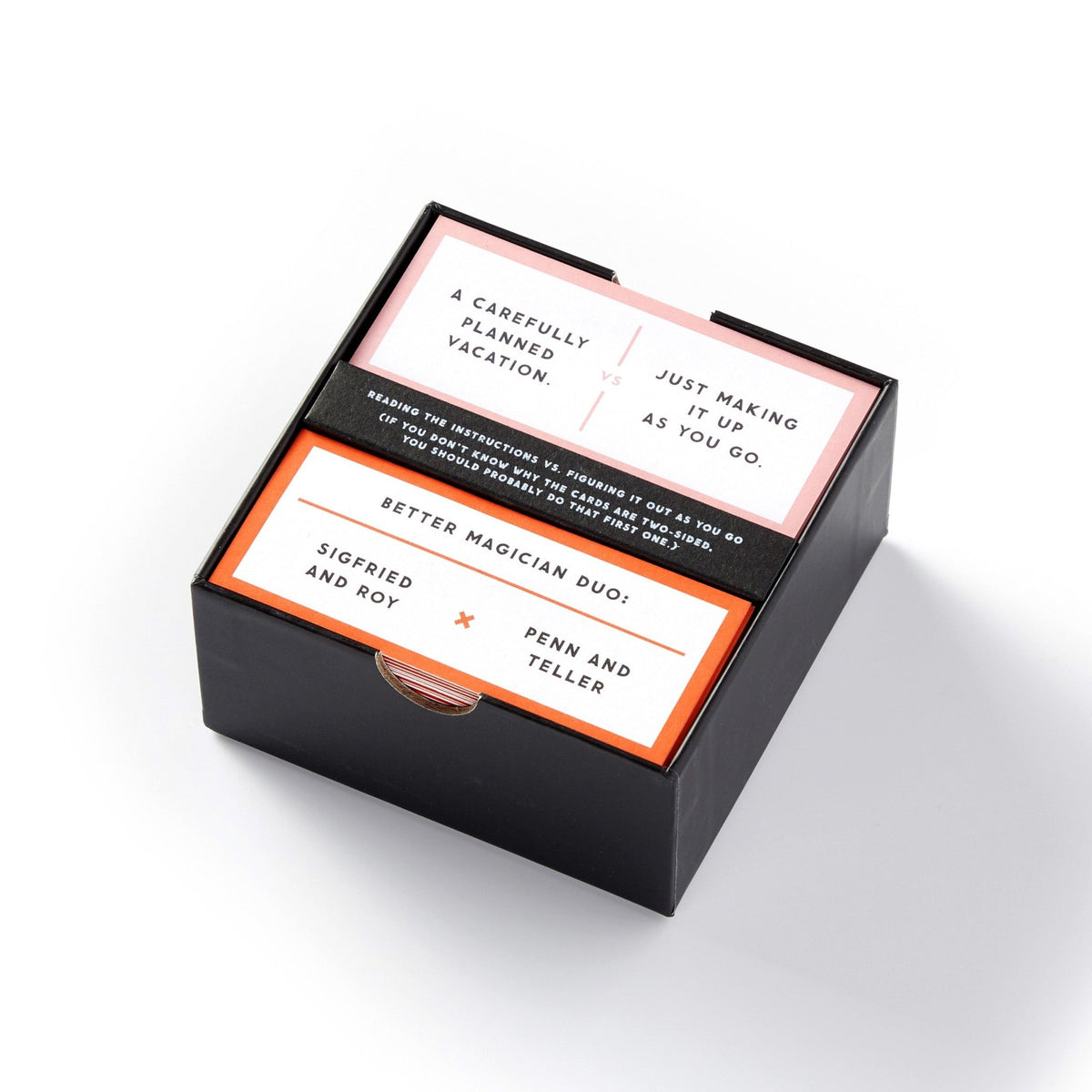 The Brass Monkey Debatable Game Set is a black box of debate cards with prompts on hot topics—like “A carefully planned vacation / Just making it up as you go”—for fun, lively social discussions.