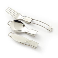 The Brass Monkey Get Lost Camping Survival Kit includes a foldable spoon, fork, and knife with locking handles, shown on a white background—essential cutlery designed for compact storage and outdoor convenience.