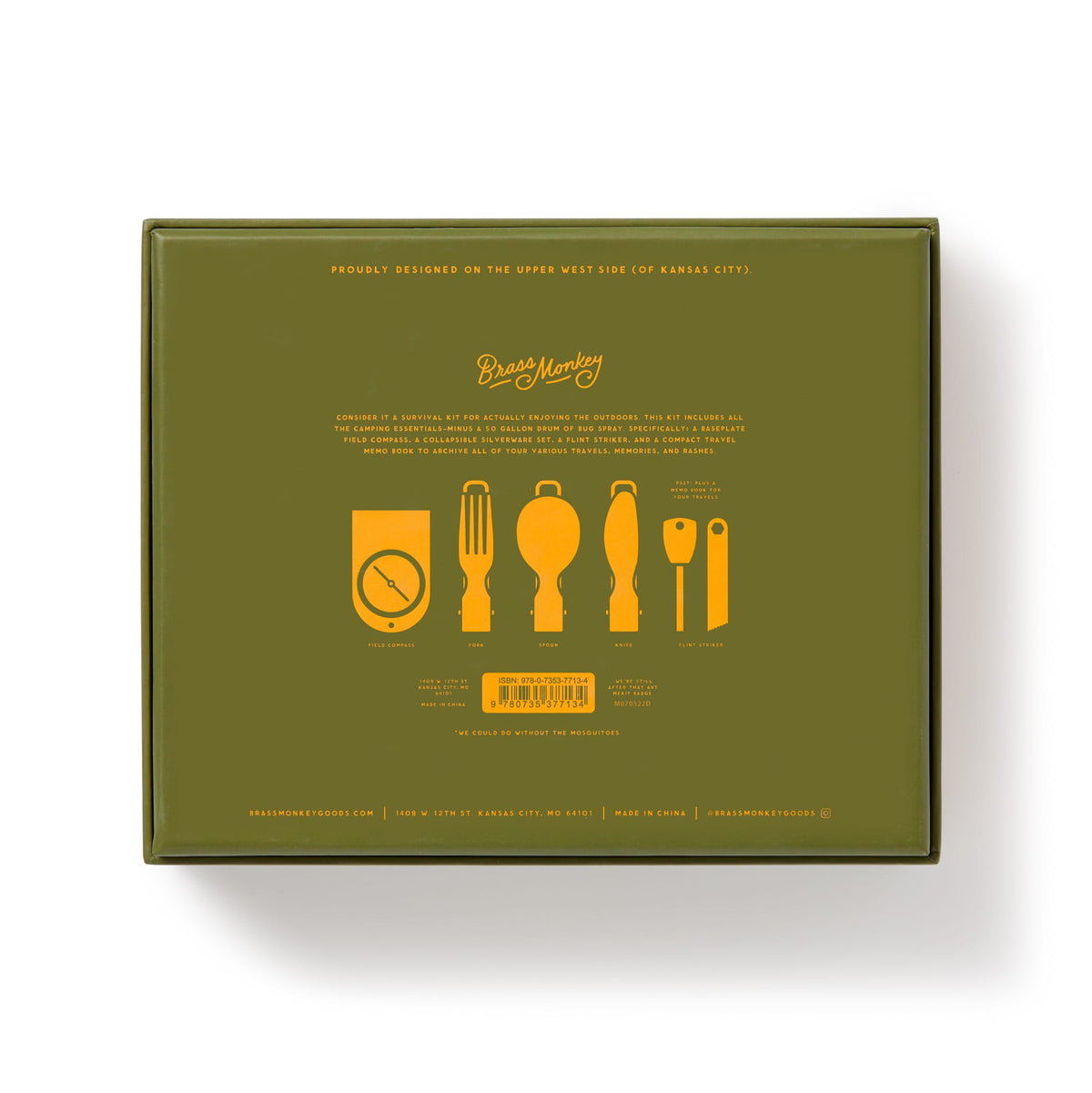 The back of a green Get Lost Camping Survival Kit box from Brass Monkey features yellow grilling tool illustrations, the brand logo, and product details in small text—ideal for camping enthusiasts. The box sits on a white background.