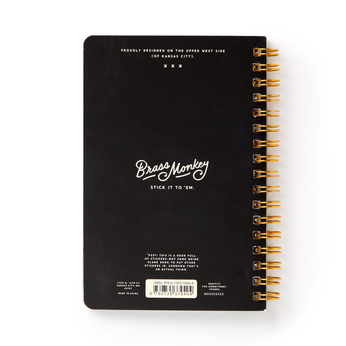 A black spiral-bound sticker book by Brass Monkey, titled In A Mood in white text. “Stick it to em” is below, with moody emoticons and a barcode featuring product details at the bottom.