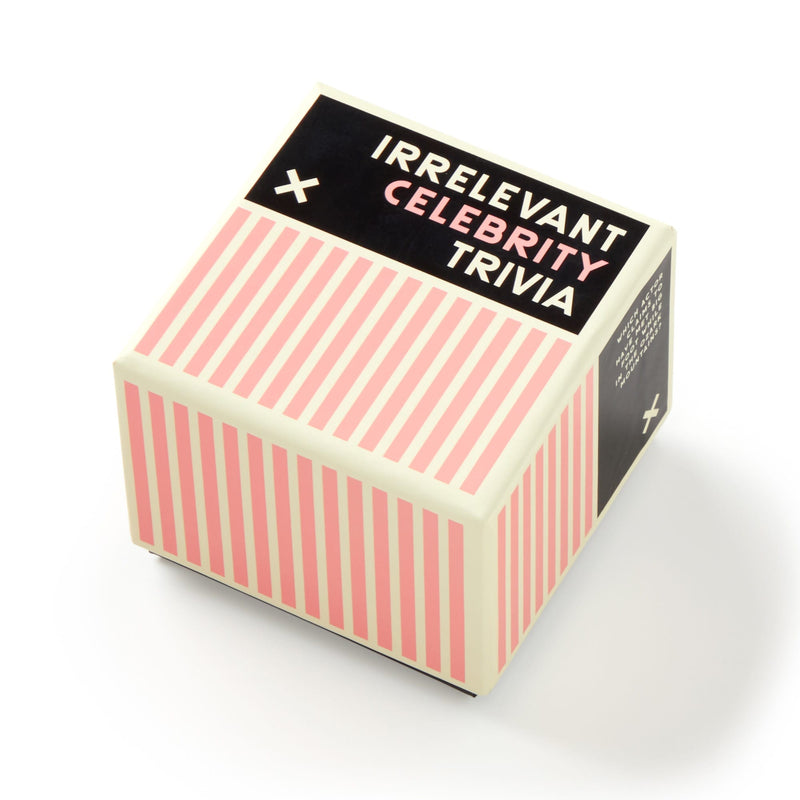 A square box with pink and cream vertical stripes and a black label reading Irrelevant Celebrity Trivia by Brass Monkey—perfect for fans of useless celebrity facts.