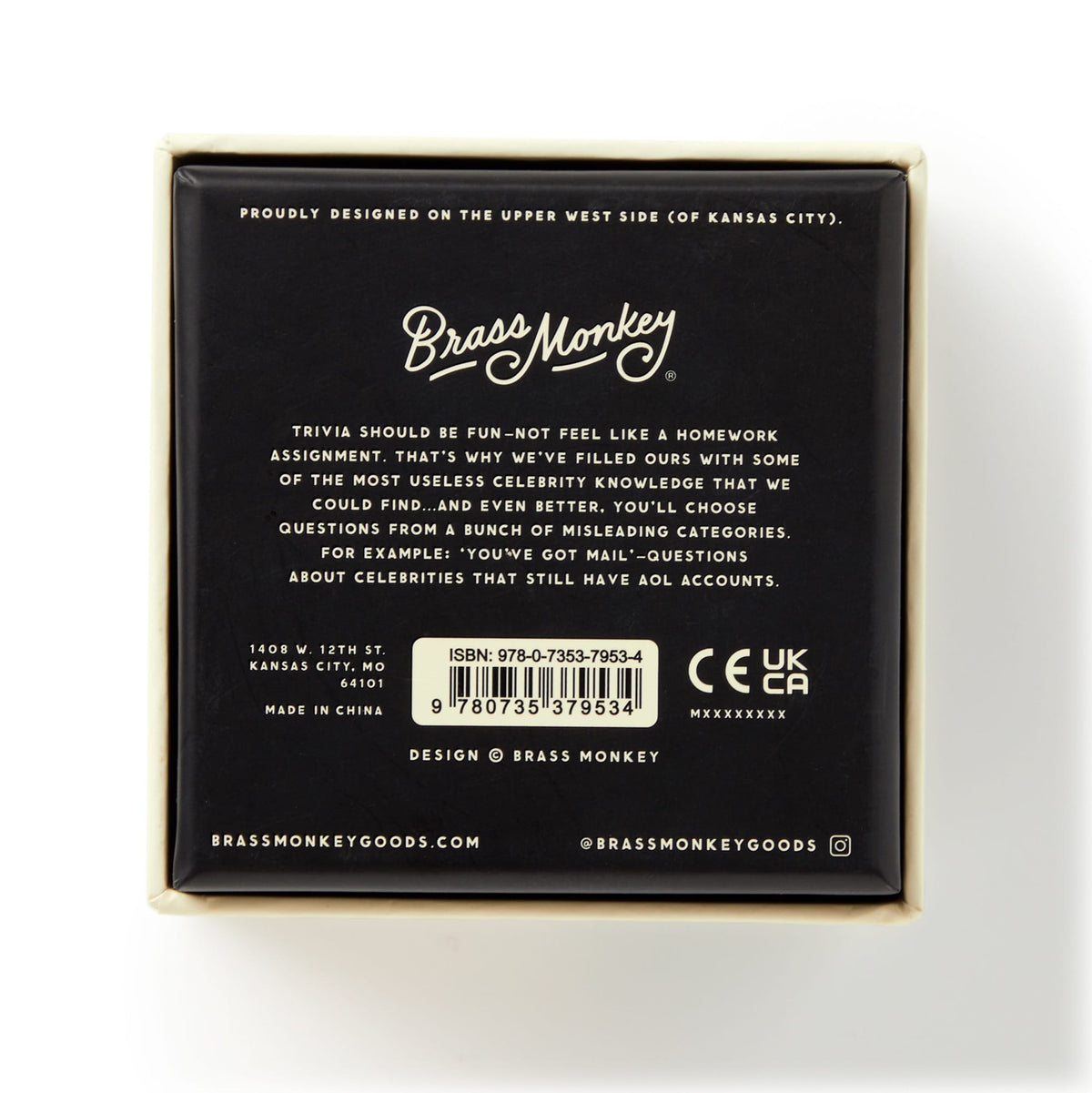A sleek black box with white text presents Irrelevant Celebrity Trivia by Brass Monkey. The minimalist design highlights fun useless celeb facts, features contact info, an ISBN barcode, and certification logos.