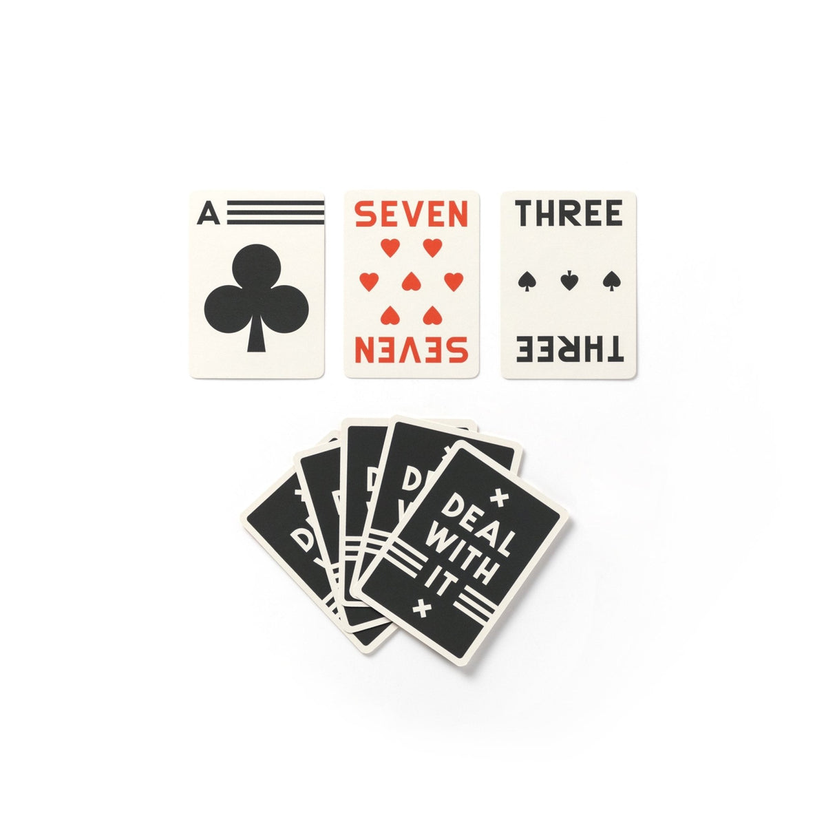 Three cards from the Brass Monkey Its In The Cards Playing Card Game Set are shown above a fan of five cards with Deal with it in bold white letters on a black background.