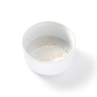 The Brass Monkey Main Course Pet Food Bowl is a durable ceramic bowl with reflective gold The Main Course lettering at the bottom, shown against a plain white background.