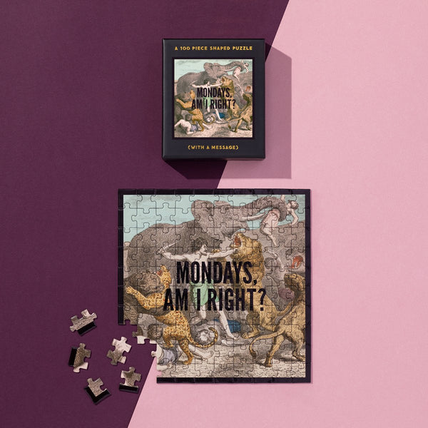 The Brass Monkey Mondays, Am I Right? 100 Piece Mini Shaped Puzzle is completed on a pink and purple background with its giftable box and some loose pieces nearby.