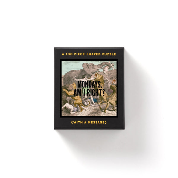 Packaged in a black, gift-ready box with gold text, the Brass Monkey “Mondays, Am I Right? 100 Piece Mini Shaped Puzzle” features classic Mondays animal artwork and the phrases “A 100 piece mini-puzzle” and “(With a message).”.