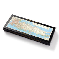 The Brass Monkey NYC Map 1,000 Piece Panoramic Puzzle comes in a rectangular black box with a colorful vintage map of Long Island, New York on the lid and yellow text along the edges—perfect for puzzle lovers.