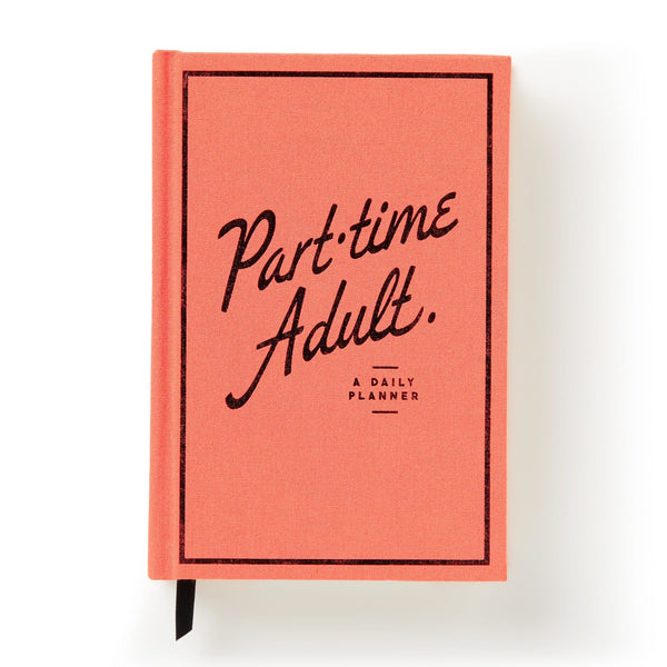 The Brass Monkey Part-Time Adult Undated Daily Planner features a coral cover with Part-time Adult. A Daily Planner in black cursive and print, plus a black border and ribbon bookmark.