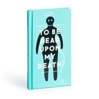 The To Be Read Upon My Death Journal by Brass Monkey is a turquoise hardcover prompt journal featuring a black silhouette and white text, designed to inspire you to record your life story.