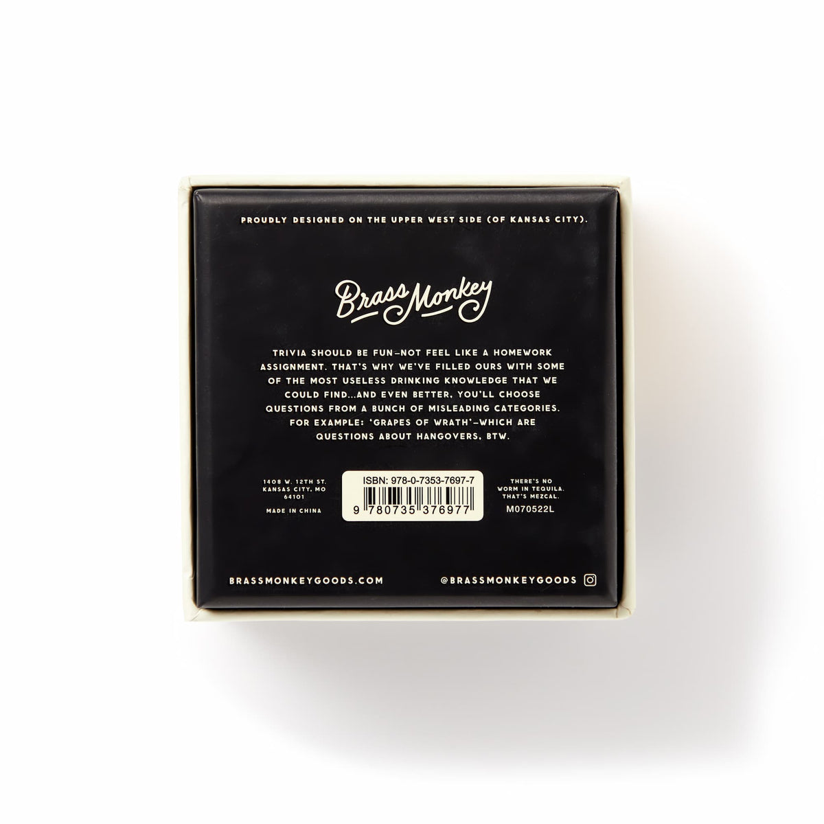 Trivial Drinking Trivia by Brass Monkey comes in a black and cream square box featuring playful drinking trivia text, misleading-category questions, branding, barcode, social handles, and website info on the back.