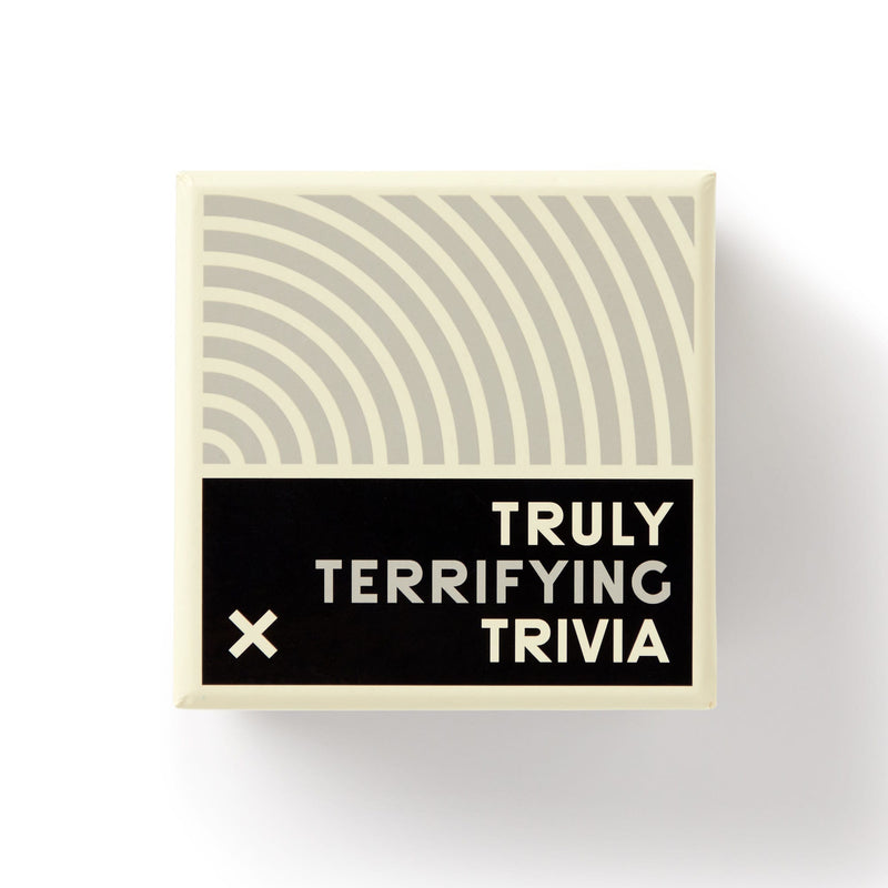 A square box by Brass Monkey, Truly Terrifying Trivia, features a black and white design with curved lines on top, bold text reading TRULY TERRIFYING TRIVIA below, and a white X on the left—a true crime trivia set.