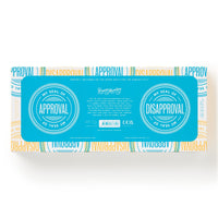 A rectangular box from Brass Monkey, labeled “Your Seal Of Approval Stamp Set,” features blue accents and two circles marked “My Seal of Approval” and “My Seal of Disapproval” over a background repeating “APPROVAL” and “DISAPPROVAL.”.
