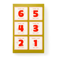 A grid of six cards on a green background features the Brass Monkey Oh What Googly-Eyed Fun Magnet Countdown Calendar, each card showing bold red numbers: 6 days left, 5 days left, down to just 1 day remaining.
