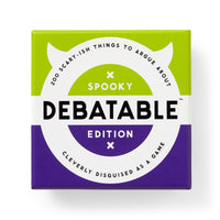 A square green and purple box labeled "Debatable Spooky Edition" by Brass Monkey, featuring 200 scary-ish things to argue about and cleverly disguised as a game.