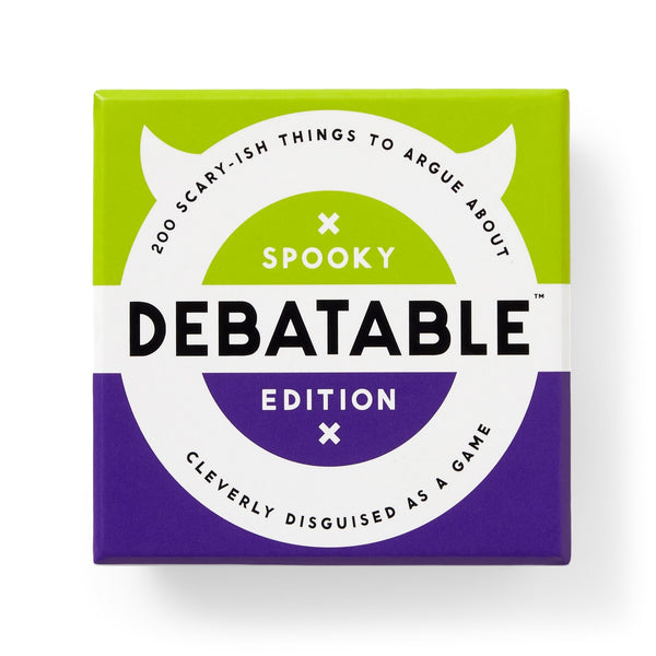 A square green and purple box labeled "Debatable Spooky Edition" by Brass Monkey, featuring 200 scary-ish things to argue about and cleverly disguised as a game.