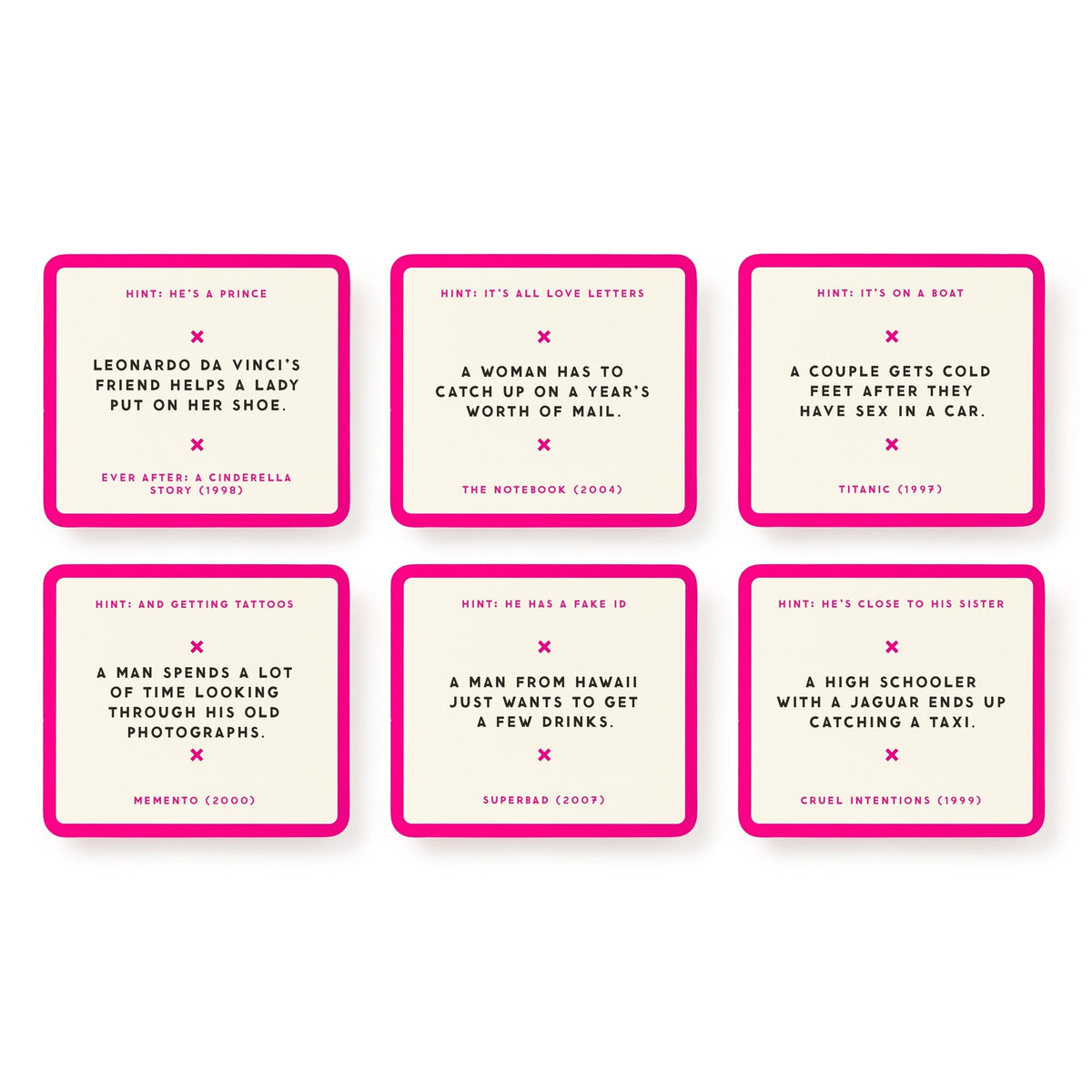 The Mini Poorly Explained Movies – Y2K Edition by Brass Monkey features six game cards with pink borders, each giving a movie hint and description. Titles include Ever After, The Notebook, Titanic, Memento, Superbad, and Cruel Intentions.