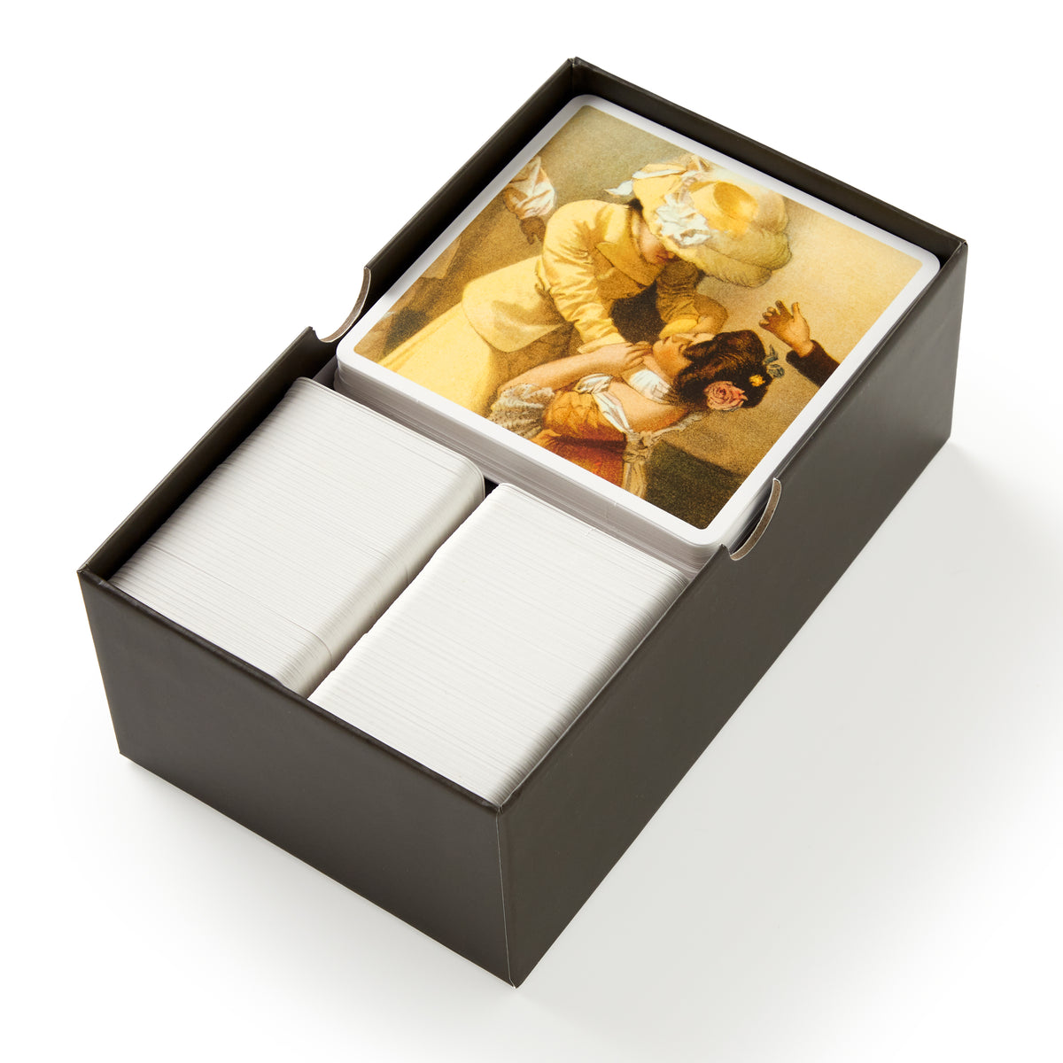 The Oddly Correct Party Game by Brass Monkey comes in a black box with stacks of blank cards and a deck featuring vintage art—ideal for adult game nights where expressive gestures inspire laughs and creativity.