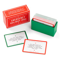 The Emergency Holiday IOUs Card Set by Brass Monkey features a labeled box with two card stacks offering funny holiday favors, such as complimenting someone’s appearance or gifting homemade cookies.