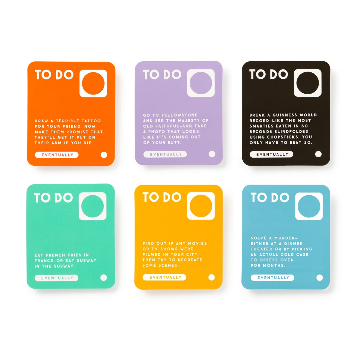The Random Things To Do Box by Brass Monkey includes six colorful square cards labeled TO DO, each with a quirky task, like “Draw a terrible tattoo for your friend.” Cards are orange, purple, black, green, yellow, and teal with an "EVENTUALLY" circle.