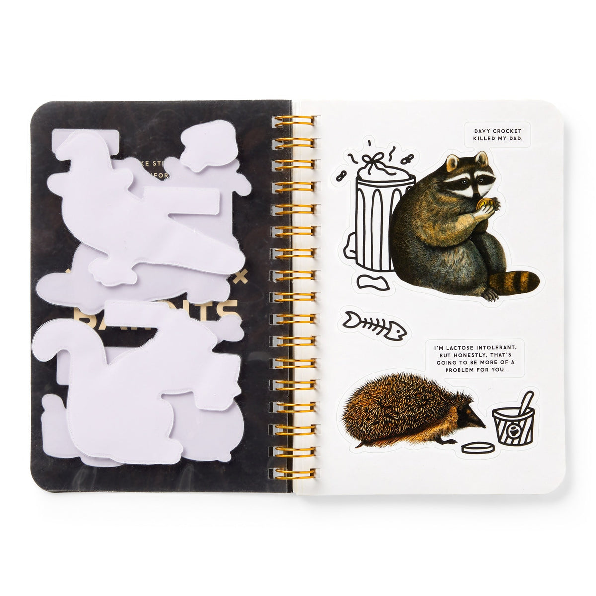 The Brass Monkey Trash Bandits Sticker Book features an open spiral design with animal-shaped sticky notes on the left and stickers of a raccoon with a trash can plus a hedgehog with food and speech bubbles on the right.