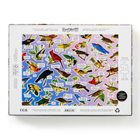 The Salty Birds 1000 Piece Puzzle by Brass Monkey features a gradient box back with illustrated birds, their names and facts, highlights 4 rounds, includes 4 bonus stickers, and shows part of a puzzle piece on the right side.